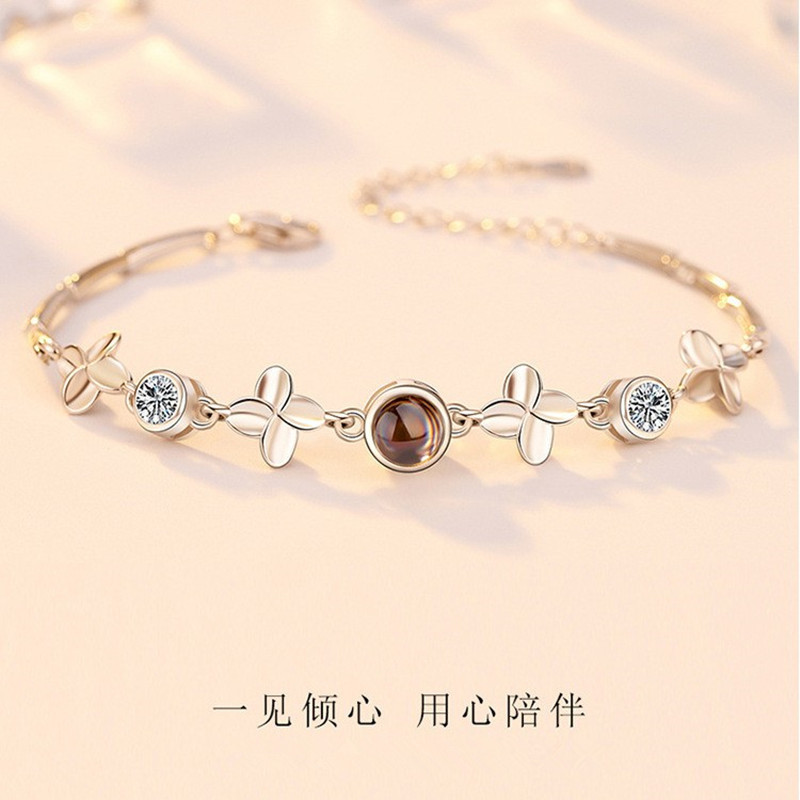 Europe and the United States cross-border best selling 100 languages I love you projection bracelet net red trembles projection four-leaf clover hand jewelry