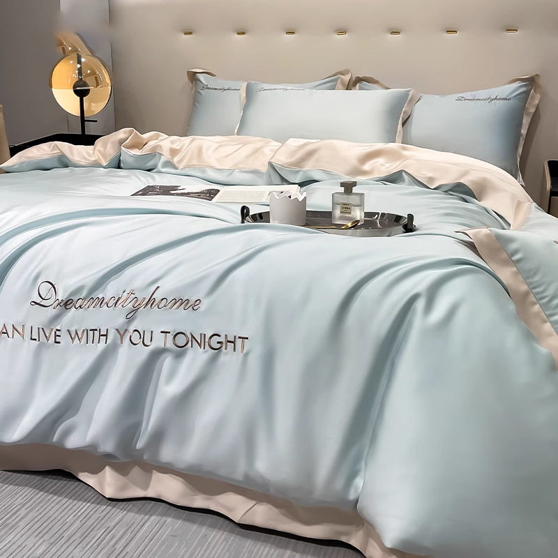 Juego de cuatro piezas de seda de hielo de alta calidad, cama de seda de lujo ligera, funda de edredón para dormir desnuda, sábana de tres piezas de primavera y verano