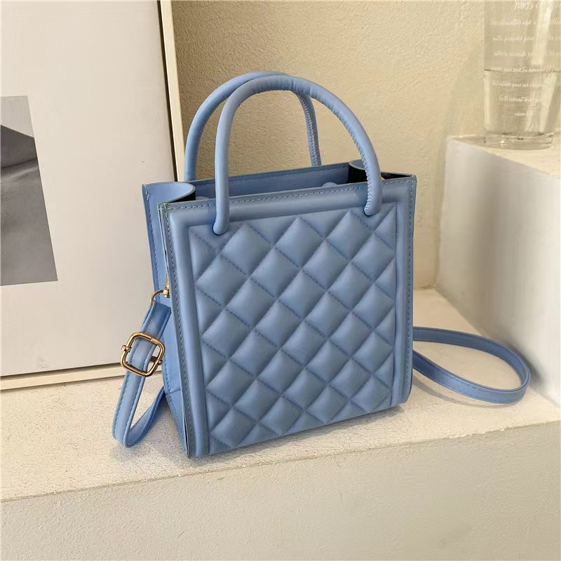 2025 primavera y verano estilo caliente moda casual niños dulces bolsa de gelatina mini bolso de mensajero de un solo hombro variedad al por mayor