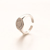 Adjustable brand ring, silver 925 sample, European style, on index finger