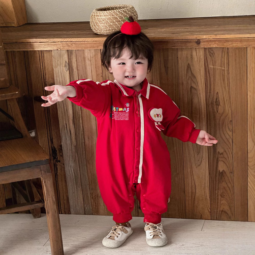 2024 nuevo producto bebé bebé coreano hombre bebé mono dibujos animados cara sonriente manzana mameluco rojo traje de año nuevo