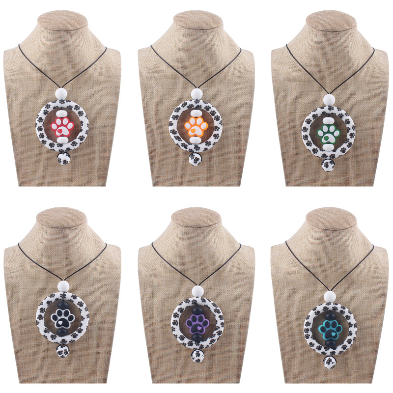 Suministros para bebés de dibujos animados perro garra collar creativo bebé cuentas de silicona mordedura molar COLLAR COLGANTE hecho a mano