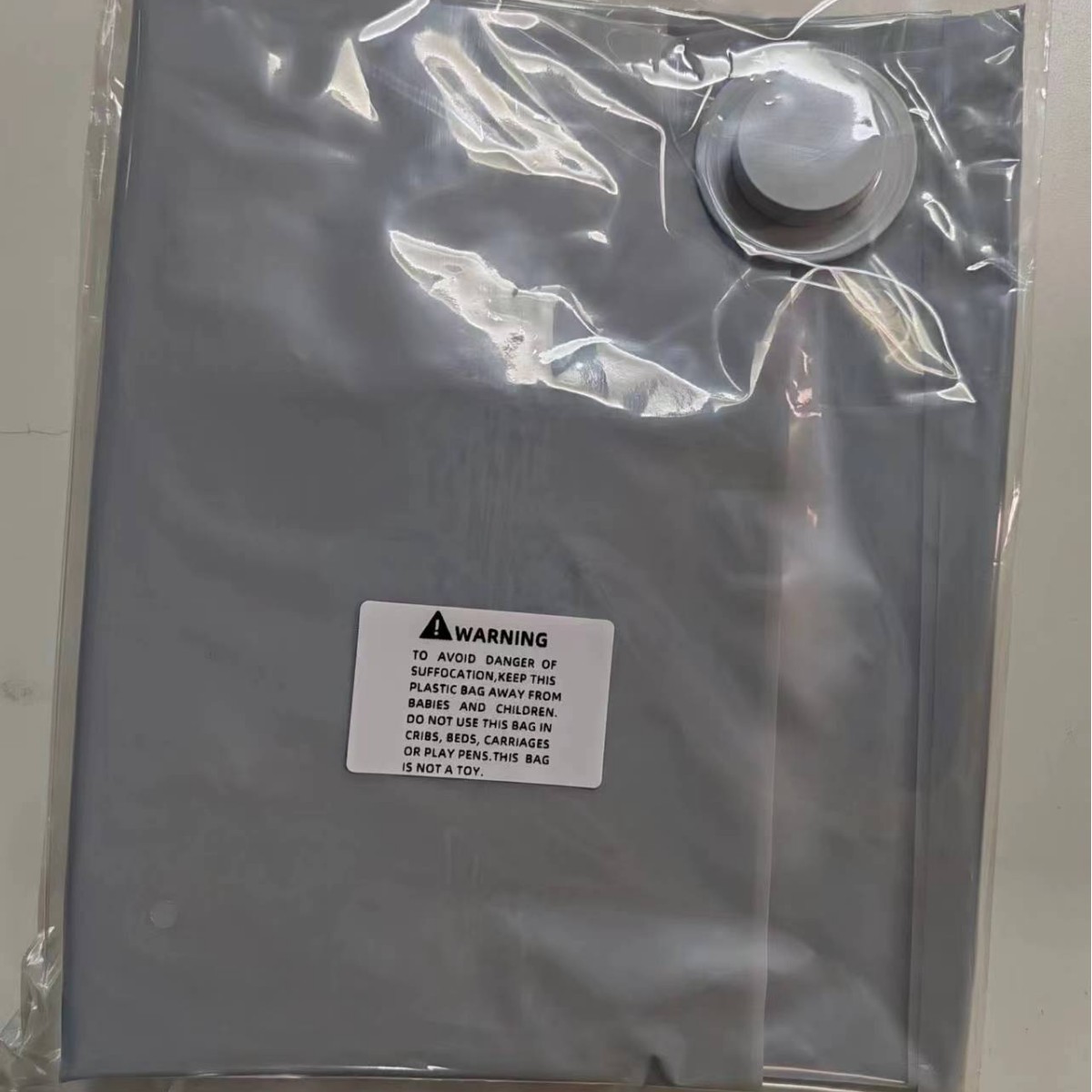 Cross-border en stock abrigo a prueba de polvo gancho a prueba de humedad bolsa de compresión de vacío chaqueta especial tirón lateral colgando bolsa de compresión