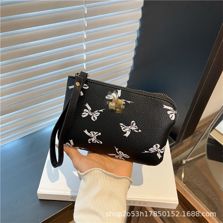 Bolso de cambio de dama de comercio exterior en 2025, bolso pequeño min. bolso de mano de nicho de Europa y América, pulseras.