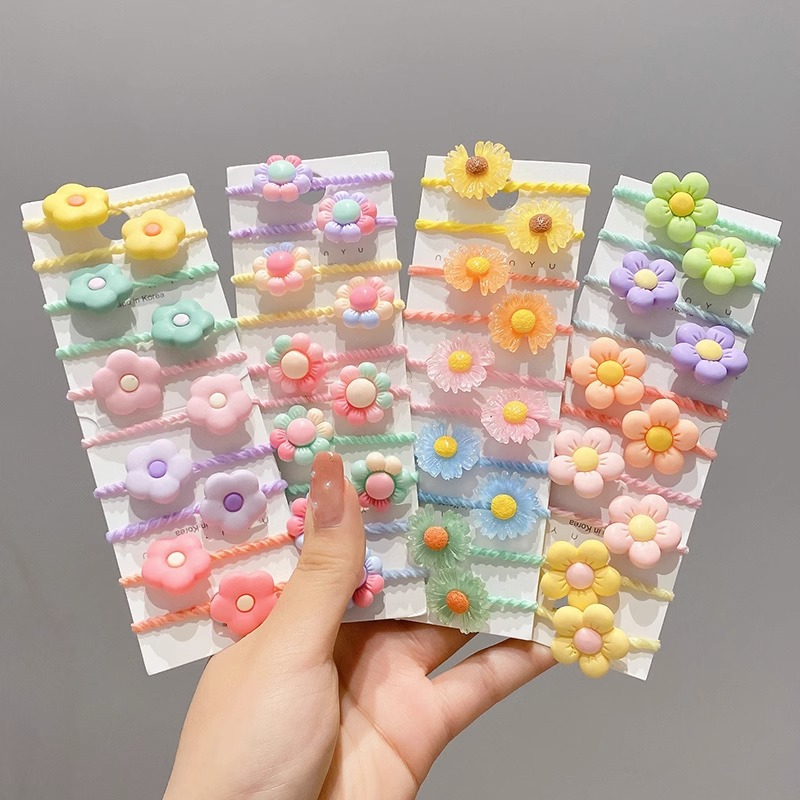 La cuerda del pelo del bebé de las muchachas de la banda de goma de los niños no lastima el pelo Los accesorios del pelo del pulgar del tamaño pequeño atan la banda de goma del pelo