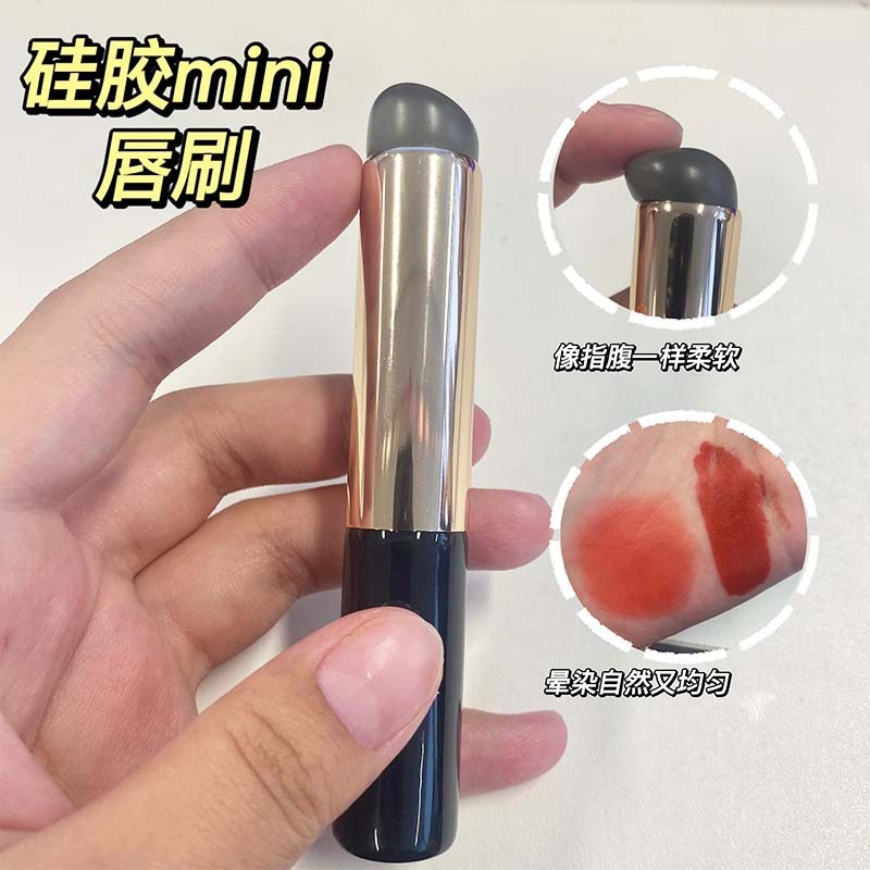 Lote original del fabricante de cabeza redonda de silicona mini cepillo de labios portátil sin costuras dedo del vientre lápiz labial cepillo corrector cepillo Q y cepillo suave