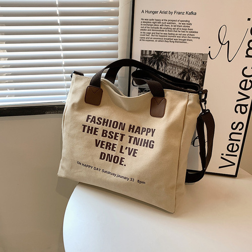 Simple canvas large-capacity casual bag for women 2024 new style lazy style one-shoulder fashion printed letter tote bag