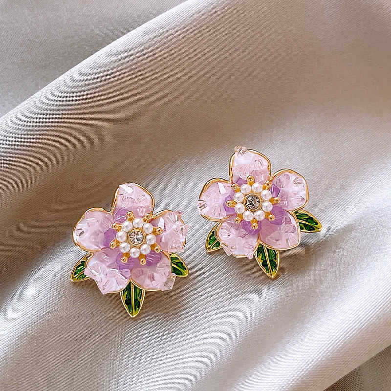Pendientes de perlas asimétricas con cuernos de diamantes súper parpadeantes de plata Pendientes de nicho de viento frío femenino Pendientes de lujo ligero de alta calidad