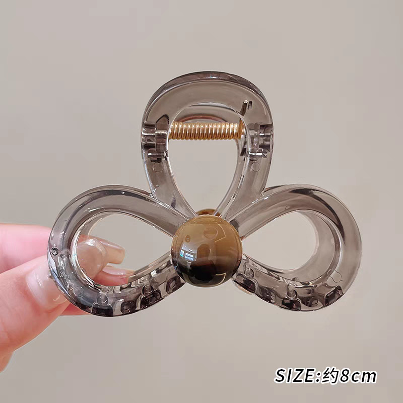 45#Tea-colored hollow 8-figure 8cm hair grip