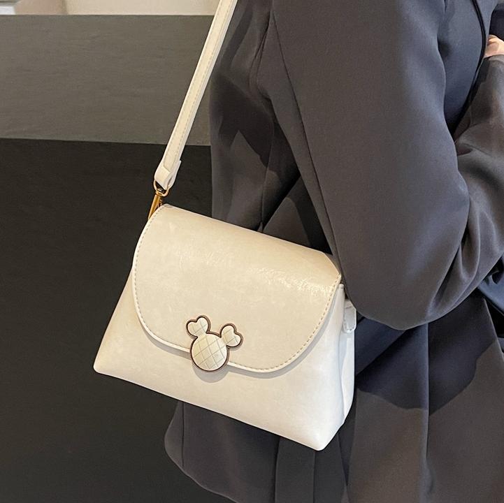 Este año, la popularidad de bolsos retrógrados para mujeres 2024 otoño y invierno nuevo bolso cuadrado de textura superior, bolso de mochila simple