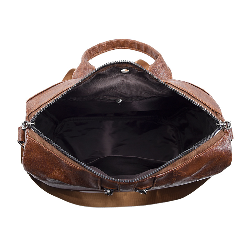 Comercio exterior al por mayor 2023 nueva mochila de cuero suave para mujer retro simple y versátil mochila de viaje multifuncional mochila escolar