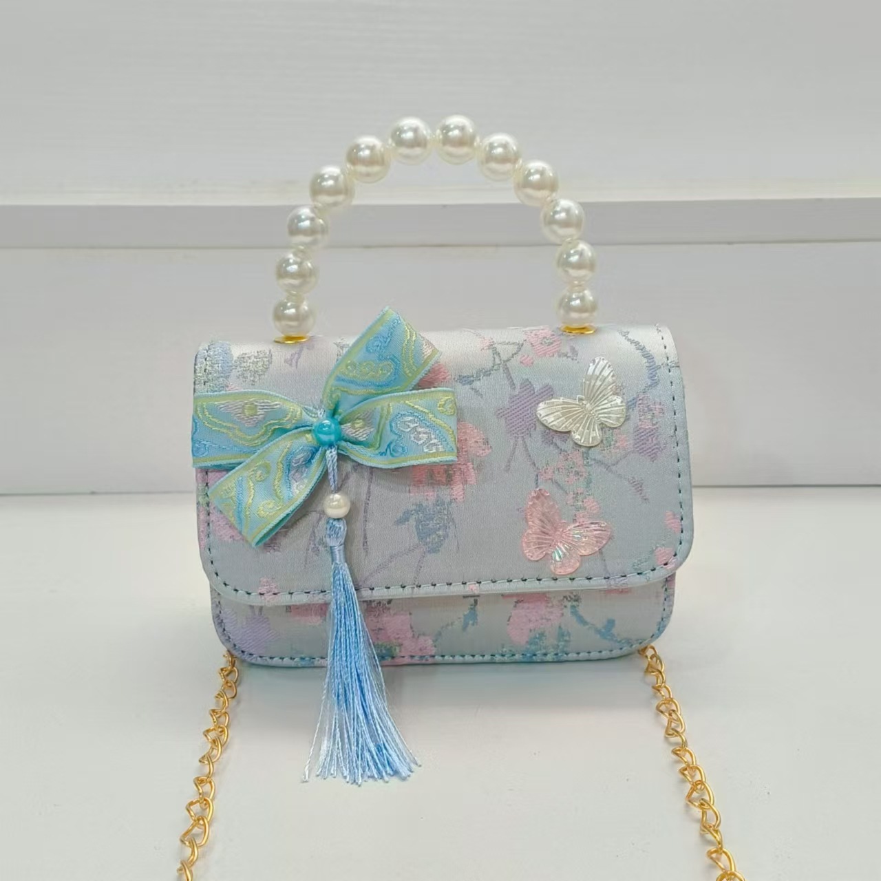 Bolsa de arco de estilo nacional de la princesa bolso de perla bolso de cadena bolso cuadrado bolso accesorios de ropa china para niños regalos de vacaciones de niñas