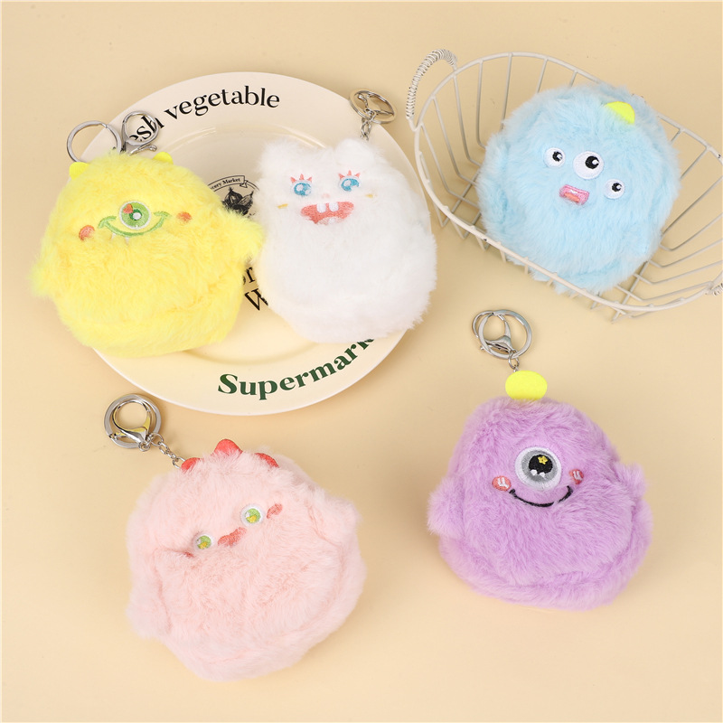 Corazón de una niña lindo pequeño monstruo bolso de cambio de peluche bolso de monedas de auriculares portátiles bolso de almacenamiento multifuncional bolso de llaves