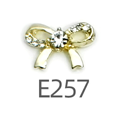 Transfronterizo Japonés arco de uñas accesorios de pajarita caliente simple todo fósforo tridimensional hueco joyería de uñas de diamantes al por mayor