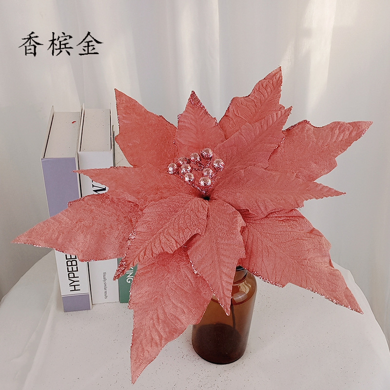 粉を撒いた綿布は紅葉の花の家庭装飾の結婚祝いの道具の金粉の綿布の花をシミュレーションしてシミュレーションの花の道具を撮影します。|undefined