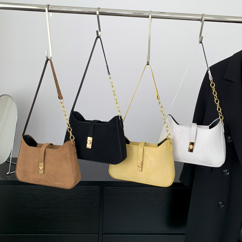 Bolso de nicho coreano para mujeres 2024 nuevo estilo de alta sensación bolso de brazo portátil personalidad bolso de hombro de moda