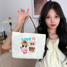 时尚卡通帆布小包女2026新款上班饭盒袋拉链手提包出行手机袋批发