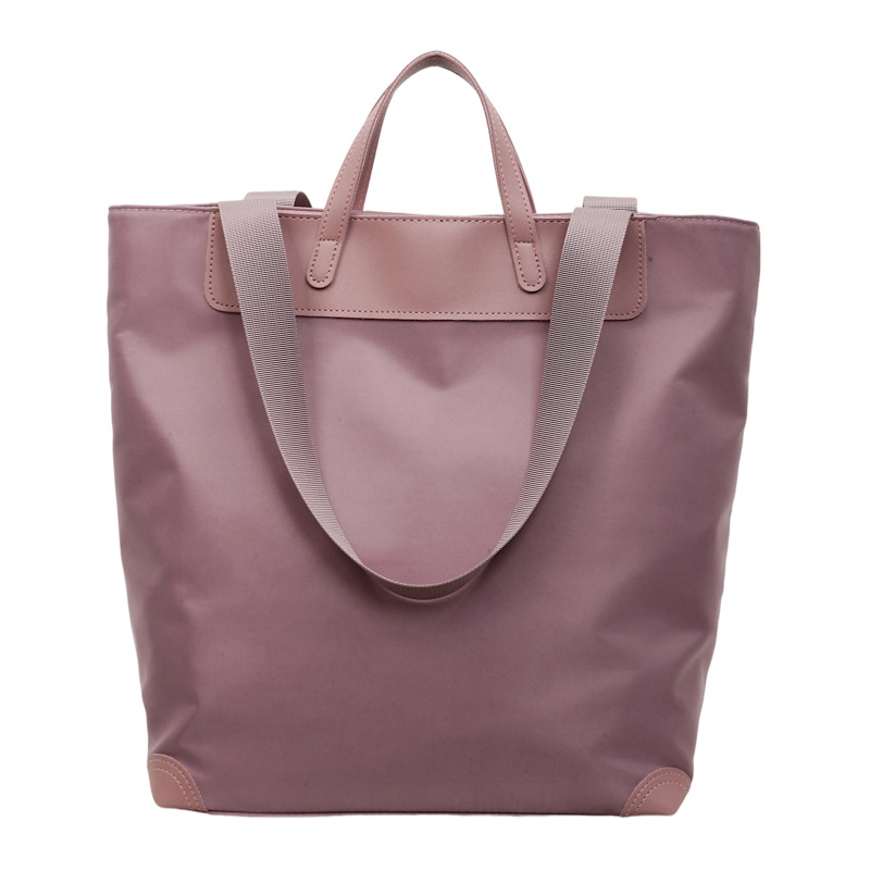 Nuevo estilo coreano de alto valor, bolso de mano casual simple, bolso de hombro de gran capacidad de viaje ligero de tela de nylon.