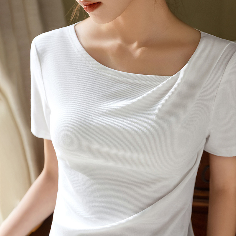 Camiseta modal de manga corta para mujer 2023 nuevas mujeres europeas fuera del hombro swing collar color sólido camiseta plisada cintura superior image 4