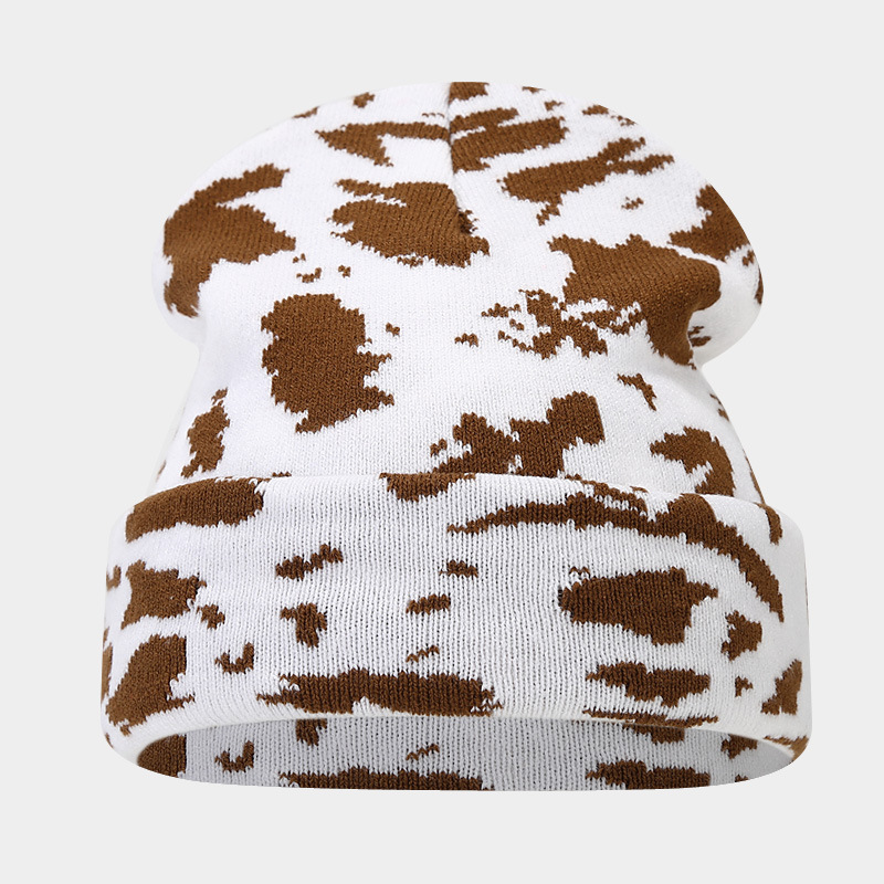 Moda europea y americana Nueva leopardo Jacquard sombrero de punto engrosado cálido hombres y mujeres otoño e invierno Gran circunferencia de la cabeza protección del oído sombrero de lana