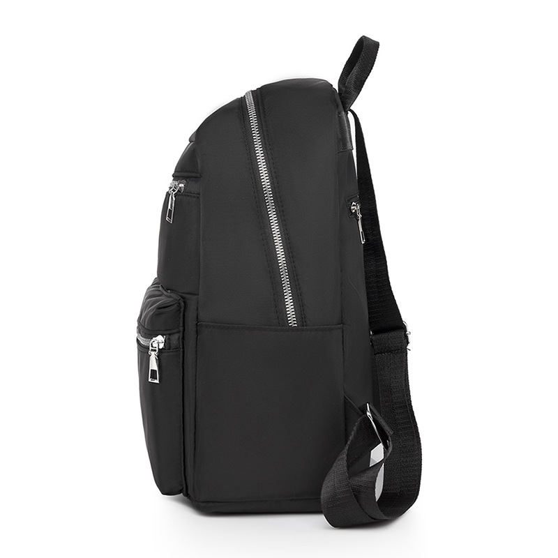 Mochila de tela Oxford para mujer 2023 nuevo estilo casual color sólido mochila para computadora de gran capacidad mochila de viaje al aire libre al por mayor