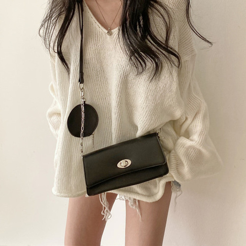 Korean chic spring new style retro loose lazy style V-neck rolled edge split fashionable pullover age-reducing sweater for women