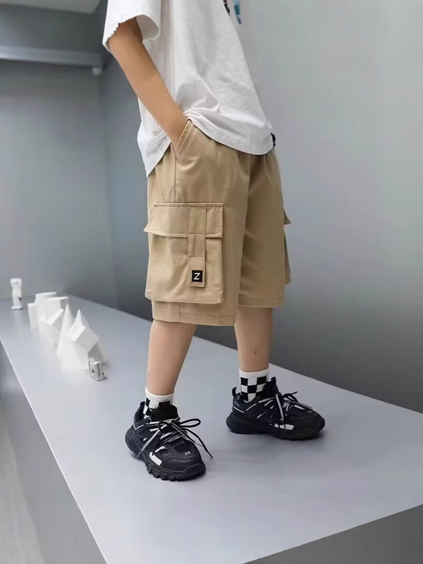 子供服男の子の夏の半ズボンの薄いタイプ2025の新型の大きい子供の五七分のズボンの中でズボンのカジュアルでゆったりしています。|undefined