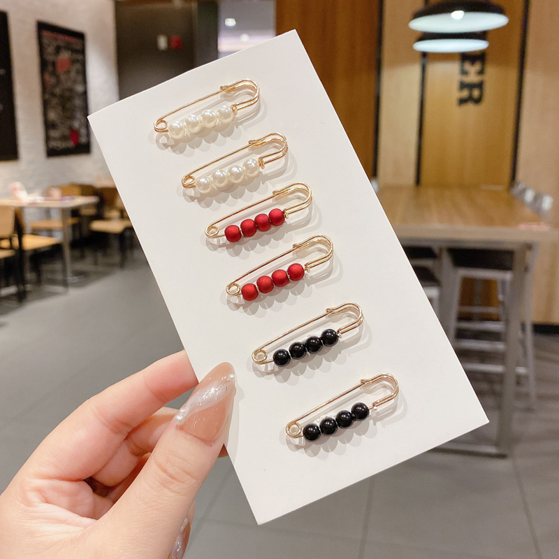 Pantalones de jeans de cintura, botones de cintura ajustados, botones ajustables fijos