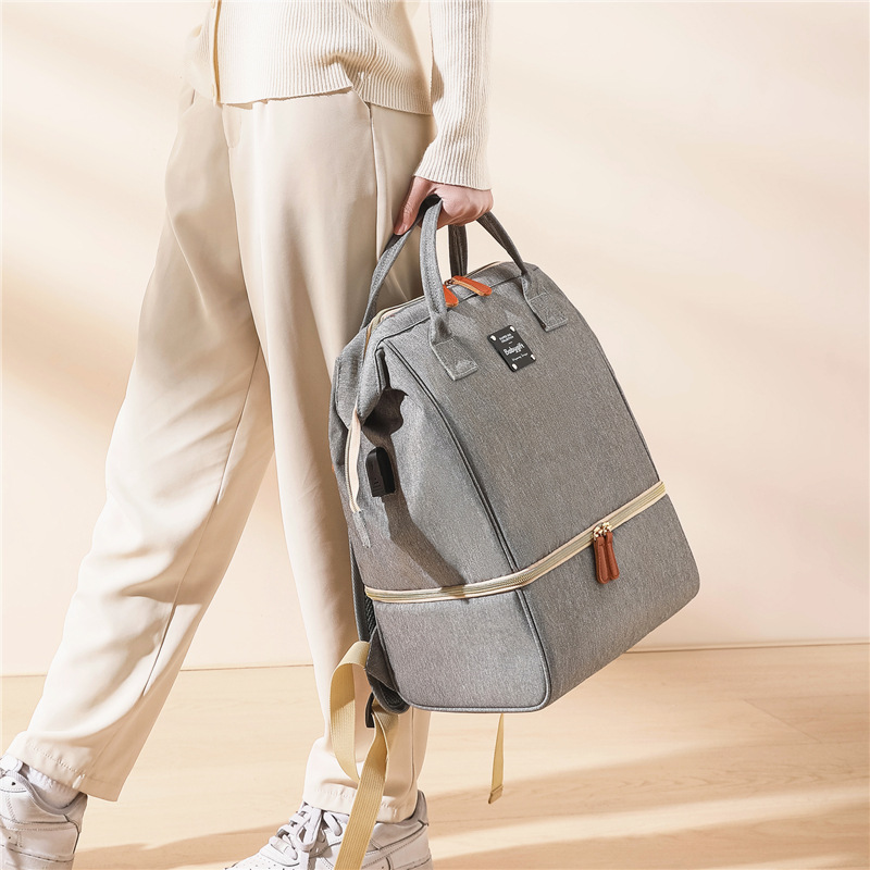 Bolsa tipo momia de gran capacidadSeparación doble zona húmeda/secaMochila multifuncional para transporte de leche materna