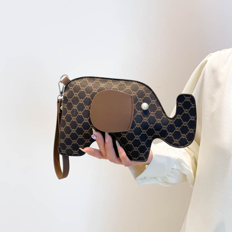 Elefante embrague mujer dibujos animados moda cena nuevo estilo retro personalidad verano exquisito 2025 bolso de mano