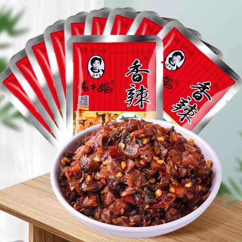 Tao Huabi Laomama Spicy Vegetable, a specialty from Guizhou Province, is a side dish that enhances the taste of meals and is ready-to-eat pickled vegetable, wholesale pickles.