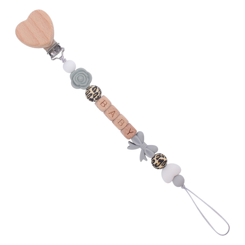 Nuevo bebé suministros dibujos animados amor Haya clip calmante bebé silicona arco pezón cadena anti-caída