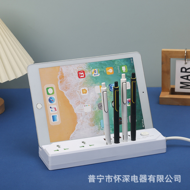 Soporte de teléfono móvil de escritorio bolígrafo socket de comercio exterior estándar británico estándar europeo americano blanco y negro mezclado para niños antichoque neutro
