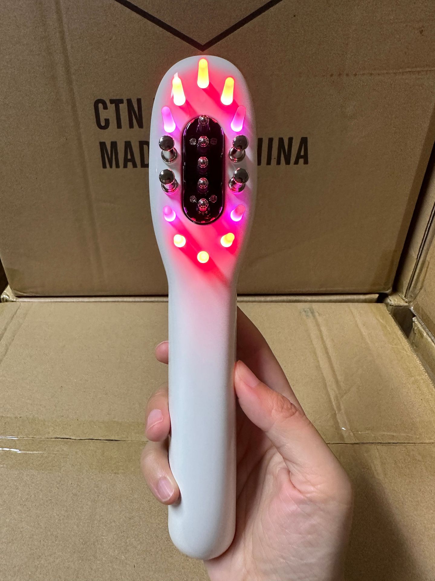 Hair Growth Comb in Use