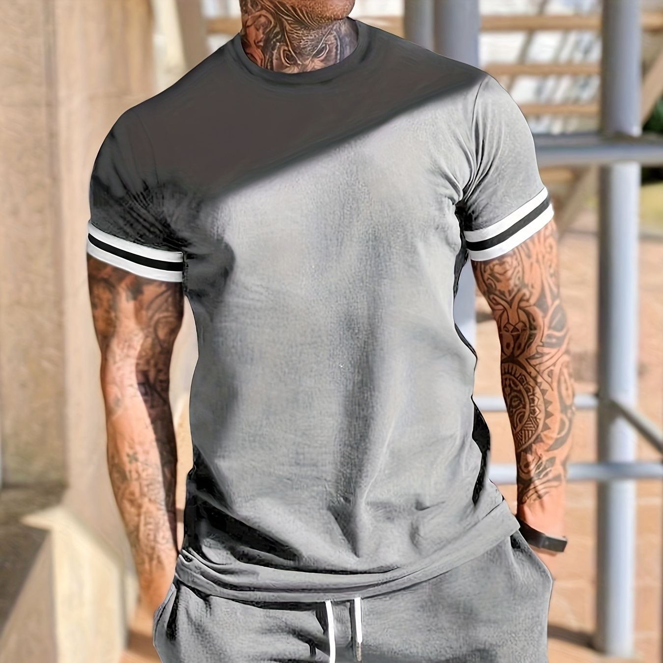 Europa y los Estados Unidos transfronterizos nuevos hombres de verano de manga corta camiseta de cuello redondo juego deportivo de pantalones cortos casuales de dos piezas para hombres