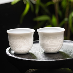 徳化羊脂玉白磁万里万里長城工夫ティーカップ家庭用お茶の主人カップ新中国式個人品茗杯