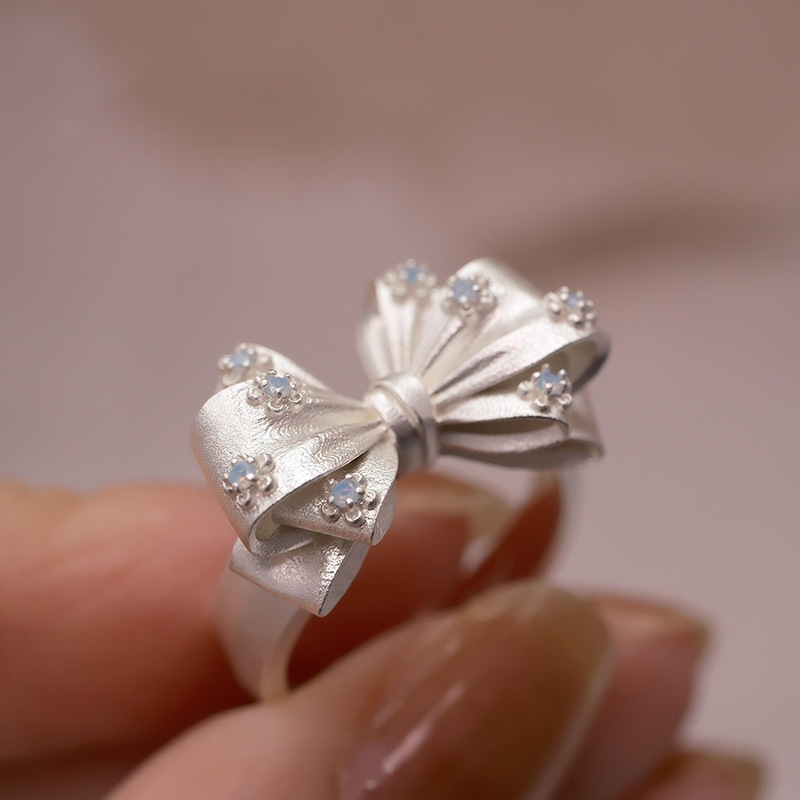 Anello fiocco in argento sterling 925 con diamanti regolabile_voghion.com