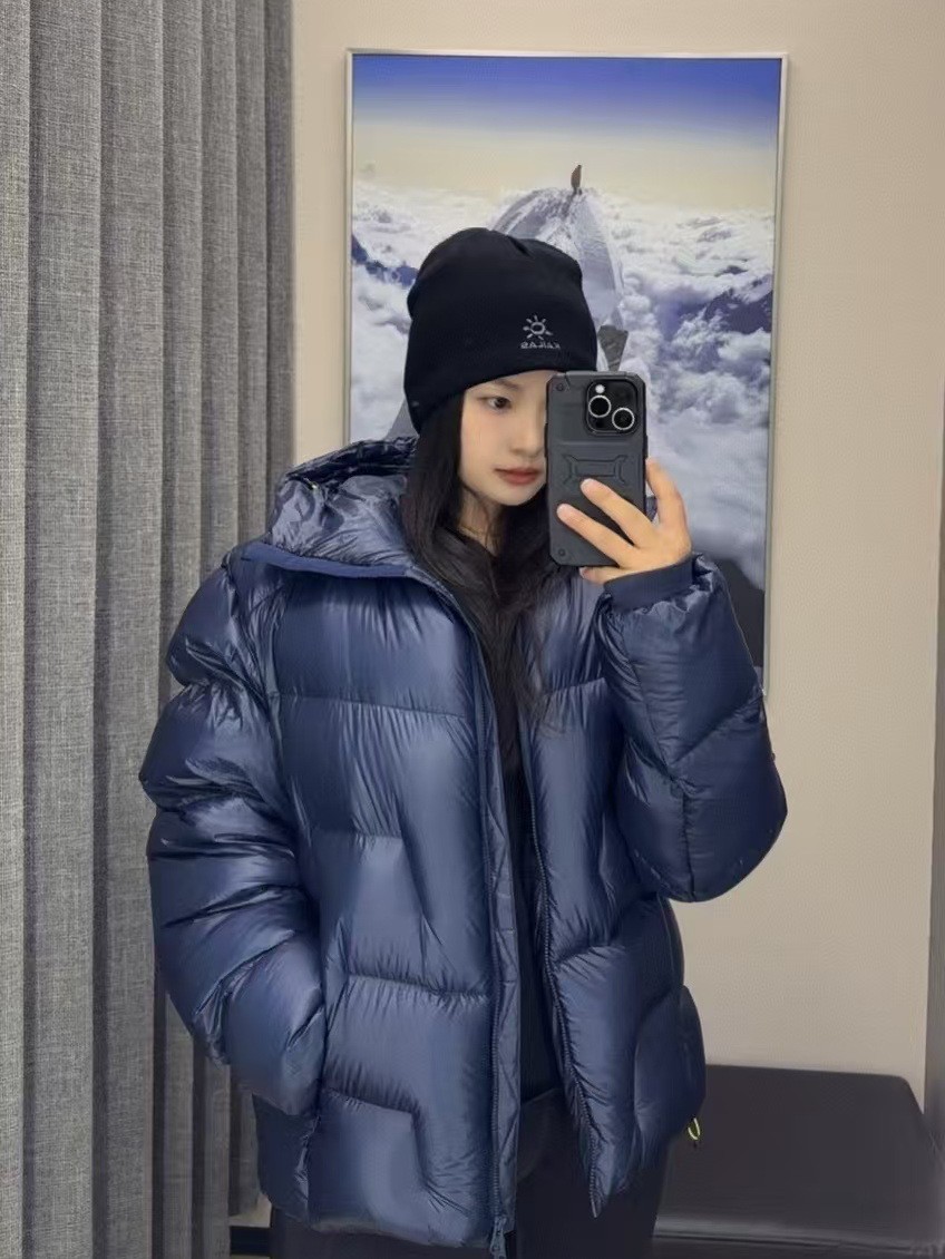 25 años de nueva serie de sol pequeño GT5000 plumón 90 blanco de seda para hombres y mujeres calentamiento impermeable ropa de montaña