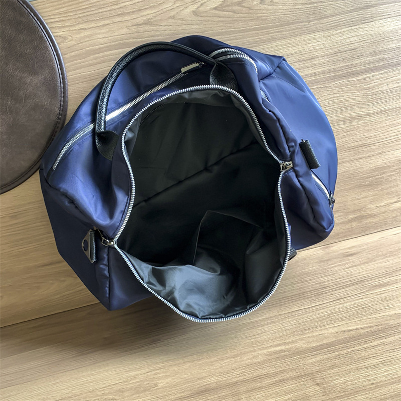 Bolso de viaje ligero de gran capacidad de nailon, bolso de deporte de ocio, bolso de hombro de viaje simple para mujer, bolso al por mayor