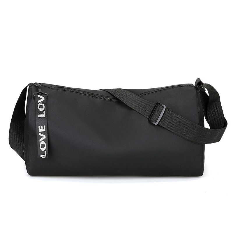 Comercio exterior nuevo tipo de bolso de hombre moda coreana bolso cilíndrico de nylon para salir simple viaje universal bolso de hombro