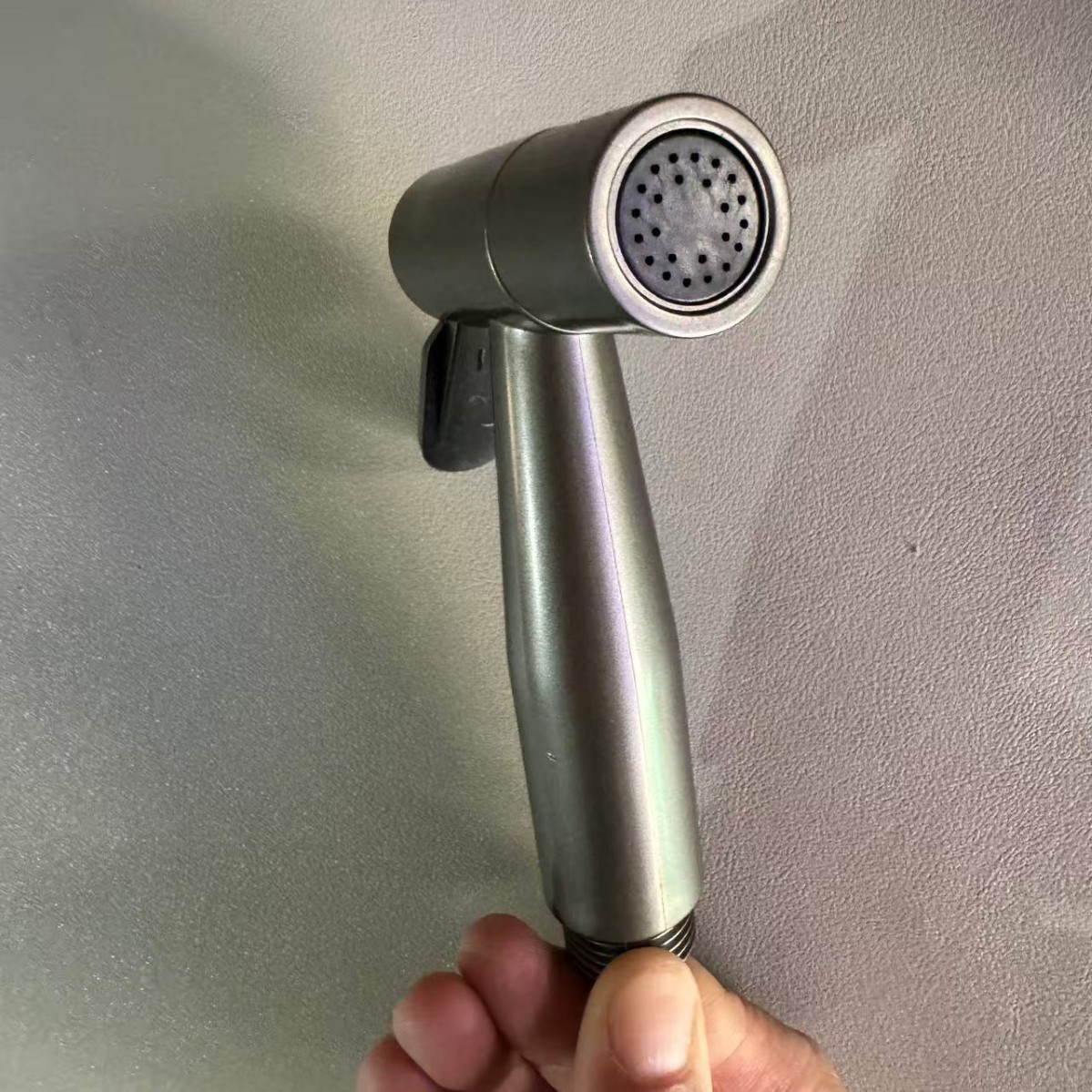 Grey high-pressure spray gun companion, bathroom flushing, handheld nozzle, toilet, feminine wash, small showerhead undefined