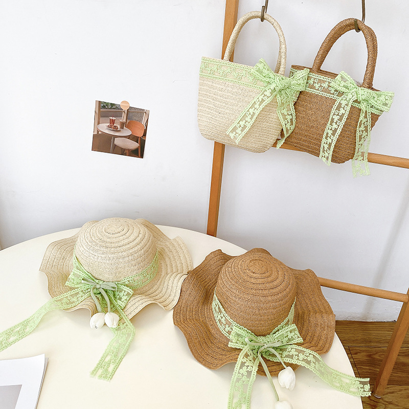 Nicho popular estilo coreano tulipán arco de papilla para niñas sombrero de paja paquete de bolsas pequeñas frescas dulces gorras de protección solar