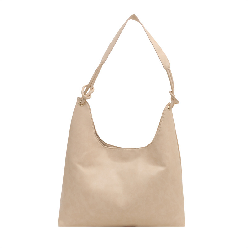 Bolso de brazo retro para mujeres 2025 primavera nueva moda hollow coreana bolso especial de gran capacidad empalmado bolso de hombro