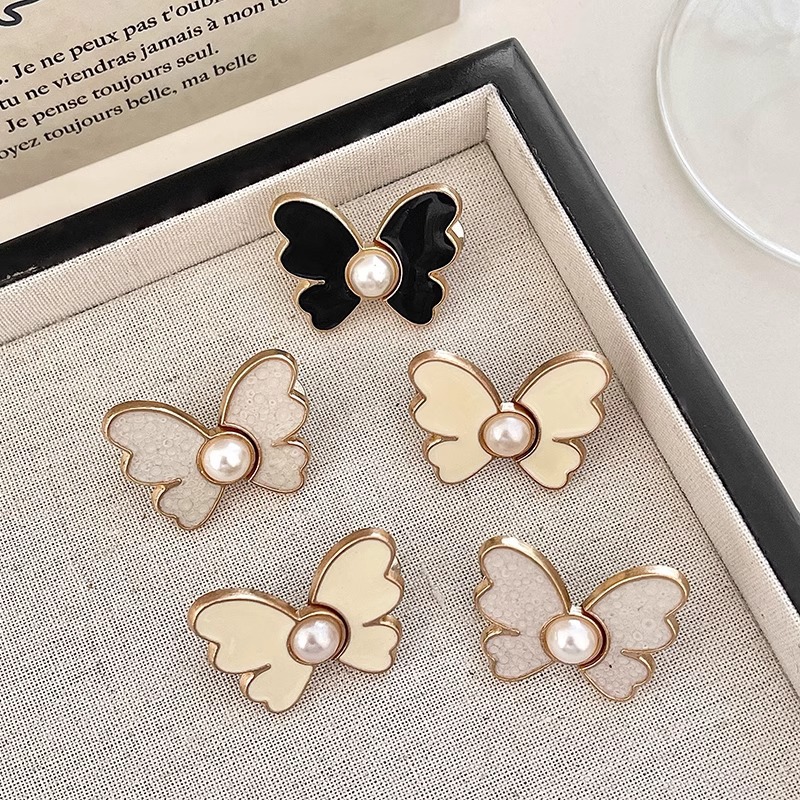 Botón de cintura de mariposa alta sensación jeans ajuste de cintura de botón fijo pantalones más grandes para reducir el pasador de hebilla sin costura