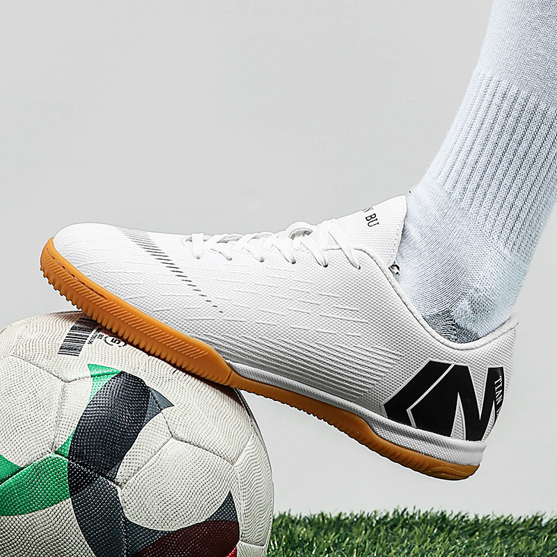 Cross-border interior de cinco zapatos de fútbol plano para hombres y mujeres zapatos de entrenamiento de piso de cemento para hombres