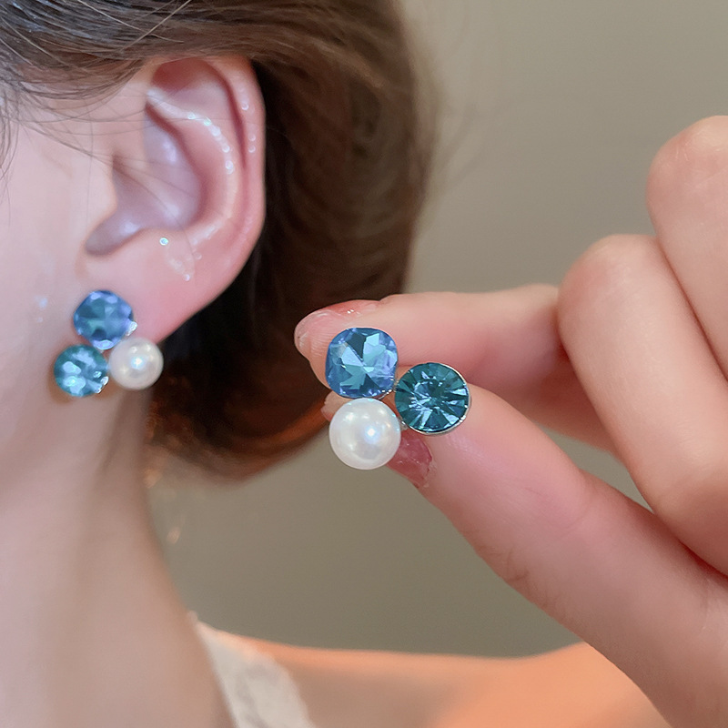 Pendientes de perlas de flor de circón de aguja de plata, pendientes de lujo de alta gama de lujo ligero exquisito, pendientes de todo fósforo blanco de moda de nicho al por mayor