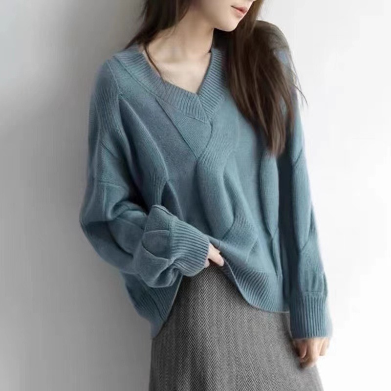 Productos europeos de alta calidad 2025 nuevo estilo de diseño nicho temperamento de moda de cuello en v camiseta de punto de flor de collar pullover suéter