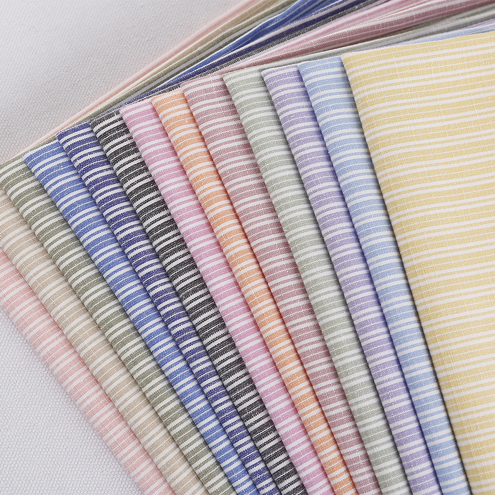 现货春夏仿麻竹节条纹面料 时尚休闲童装连衣裙女装衬衫条纹布料