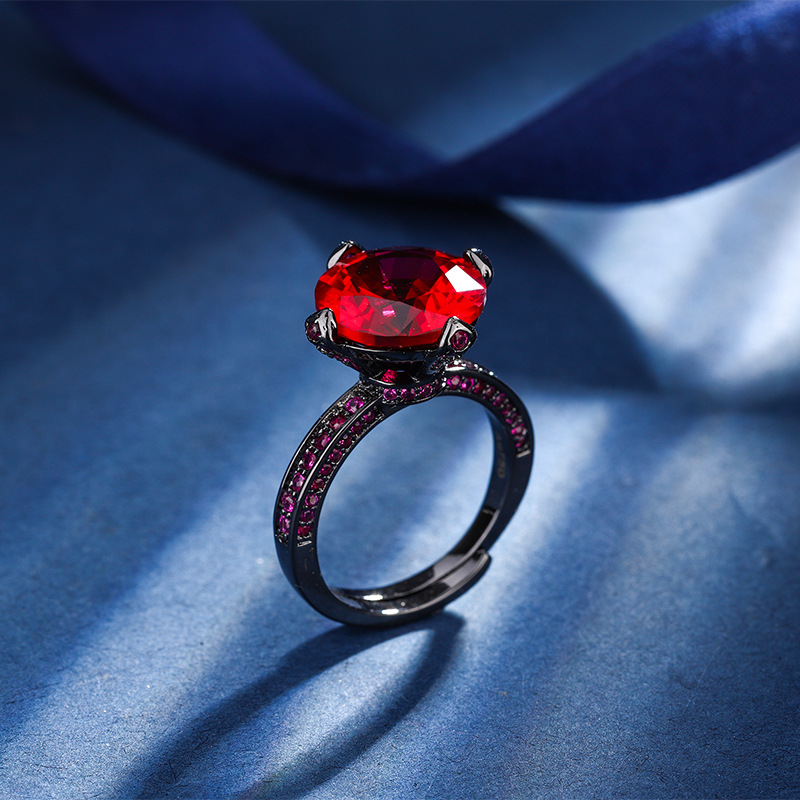 2024 Nueva Zhuang Sheng joyería de cobre de fondo chapado en oro de simulación corindón redondo anillo de personalidad de Oro Negro femenino 12mm