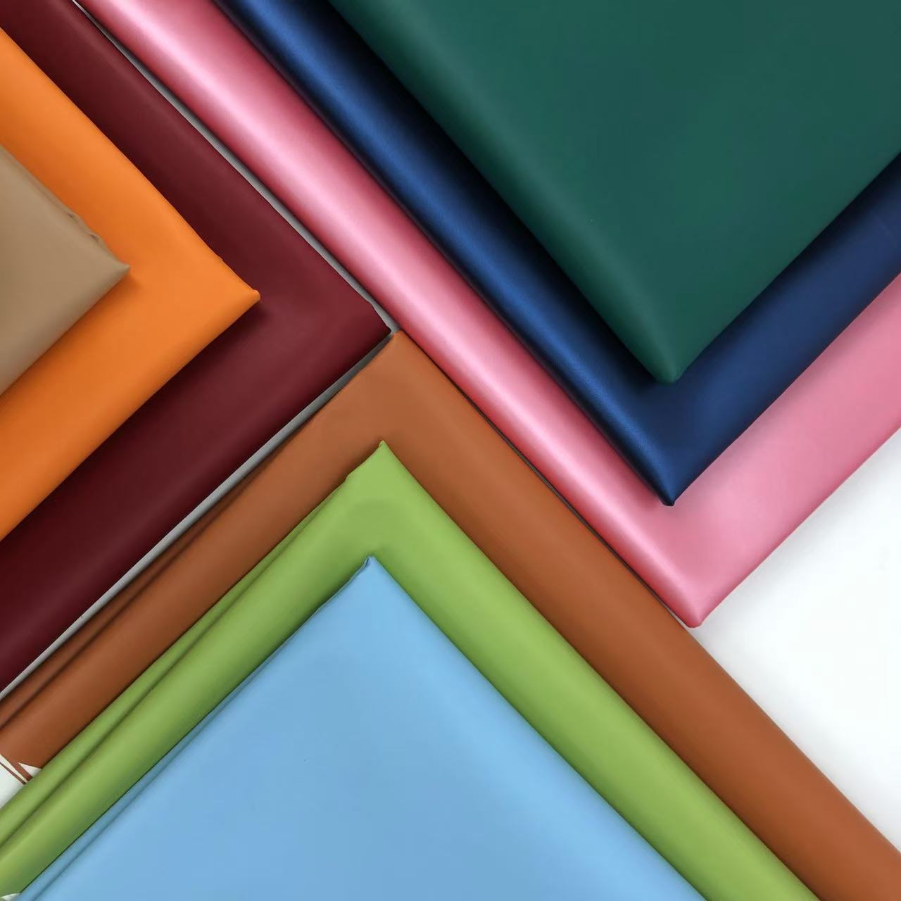 现货零售薄款PU皮革小毛孔纹 多色100纹水刺底 礼盒文具包装内里